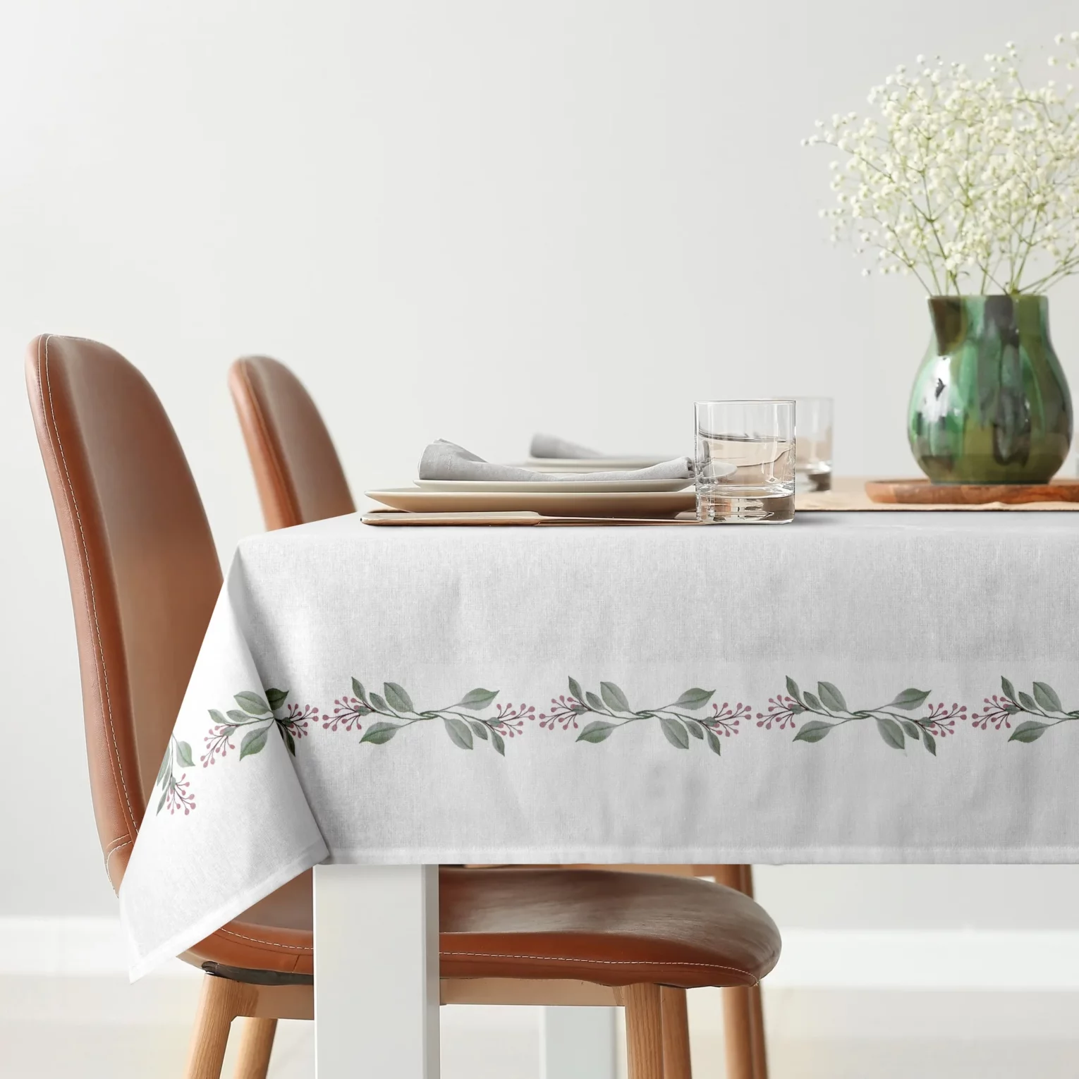 Obrus na stół plamoodporny 140x180 cm biało, zielony z motywem roślinnym - LILY