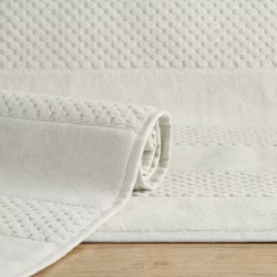 Dywanik łazienkowy bawełniany zdobiony geometrycznym wzorem 60x90 cm  JESSI